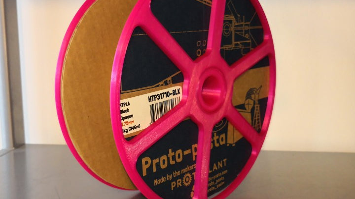 Edge protectors for use with roller-style spool holders