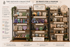 Display example of decorative items and signs with 'The Elevate Collective' branding on a wooden shelf.