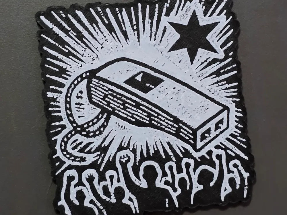 Black and white illustration of a book with a star and text on a dark background